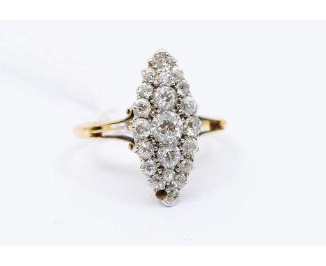 A Victorian diamond and 18ct gold cluster ring, comprising a marquise shaped cluster of claw set old cut diamonds, total diam