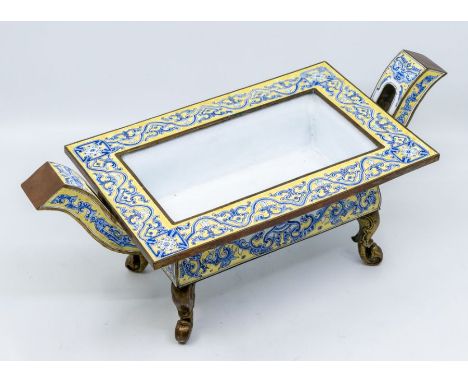 A Canton enamel rectangular censer, Qianlong mark and possibly of the period, the sides decorated with taotie masks in blue e