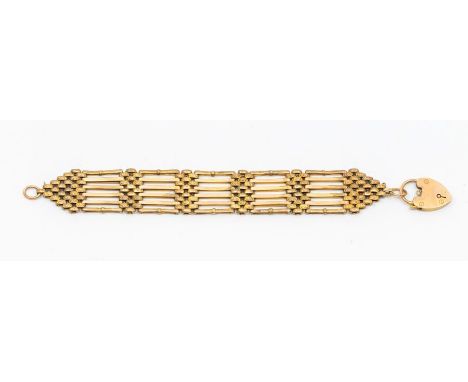A 9ct gold 6 row gate bracelet with plain and textured links, padlock clasp, length approx. 18cm, weight approx. 22.7gms Cond