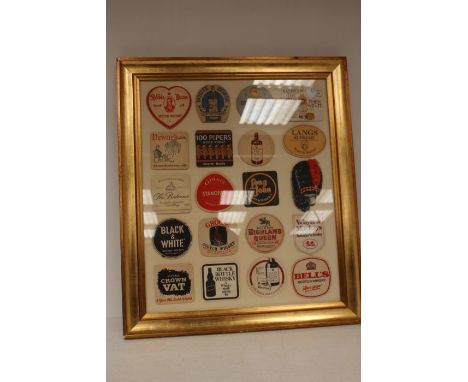 A large framed Selection Of Scotch Whisky Based Beer Mats