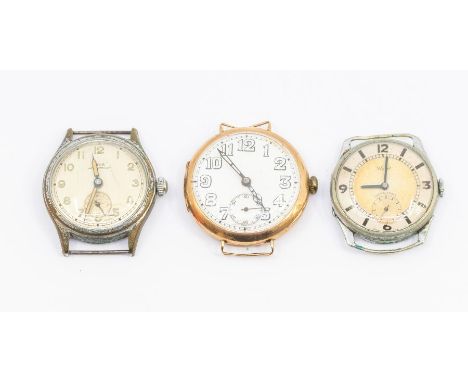 A 1930's 9ct gold gents trench watch, white enamel dial, (hairlines) Arabic numeral markers, subsidiary dial, approx. 28mm, t