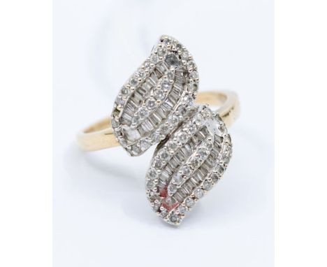 A diamond and 9ct fold cluster ring, comprising of brilliant cut diamond/ two missing. Size T. Total gross weight: 5.7 grams.