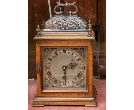 A Garrard Burr oak cased eight day bracket clock, silver plated caddy top, silvered dial with black Roman Numerals, three win