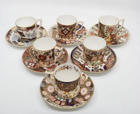 A set of six Royal Crown Derby Imari palette coffee cups and saucers from the Curator's Collection patterns include: Purdoe, 