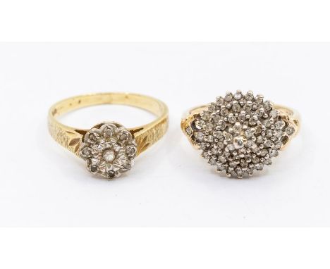 A diamond and 18ct gold cluster ring, comprising an illusion set diamond cluster, setting approx. 8mm, to textured shoulders,