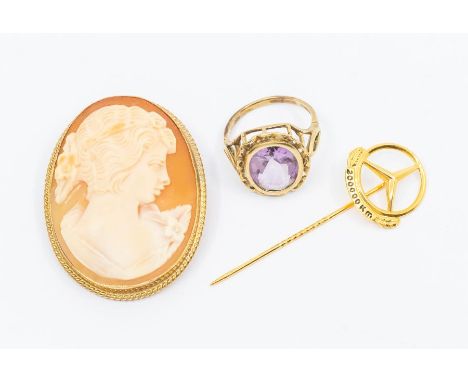 A 9ct gold and amethyst ring, size N, total gross weight approx. 3.5gms,&nbsp;a 9ct gold and cameo brooch with rope edge bord