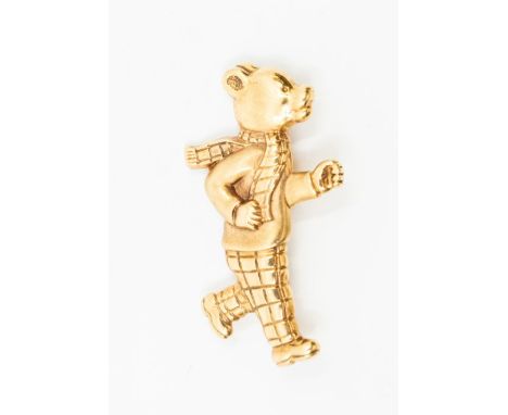 A 9ct gold Rupert the bear novelty brooch, length approx. 45mm, stamped E.V.T, roller clasp and pin, weight approx. 13.6gmsCo