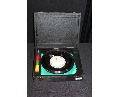 K&amp;C tabletop roulette board, wheel and betting chips, housed in a travelling case