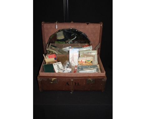 Leather clad trunk, together with a mirror and books, (qty)