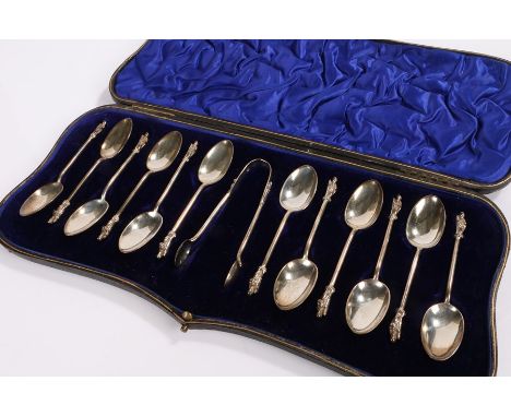 Set of twelve Edward VII silver apostle spoons and sugar tongs, London 1906-1907, maker William Hutton &amp; Sons Ltd, housed
