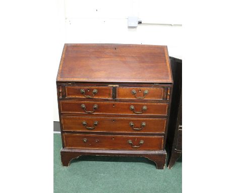 Victorian mahogany bureau, with a rectangular top above a sloping fall, two short and three long drawers to the base on brack