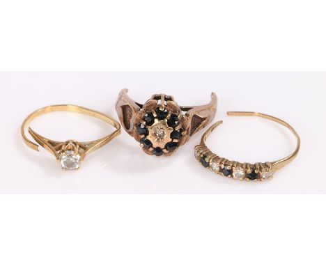 Three 9 carat gold and stone set ring sections, 5.7 grams