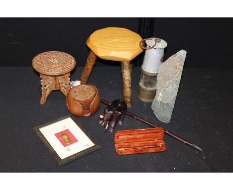 Works of art, to include a miners lamp, stool, miniature table, coasters, pipe, etc, (qty)