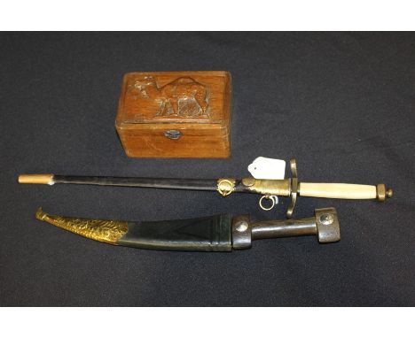 Reproduction Georgian British Naval officers dirk, together with an Arab janbiya type dagger and wooden box with a camel carv