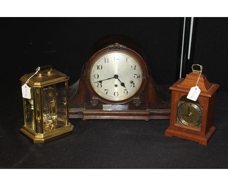 Clocks, to include an Oak cased example, a miniature bracket clock and another clock, (3)