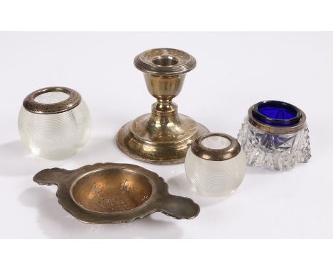 Silver, various dates and makers, to include tea strainer, squat candlestick, silver mounted glass salt, two silver mounted g