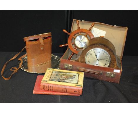 Oak cased mantel clock, barometer housed in a ships wheel frame, plated salver, binoculars, two books, small brown leather su
