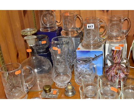 A GROUP OF GLASSWARES, to include five boxed Dartington commemorative tankards, an etched decanter (nibbles to stopper), a bo