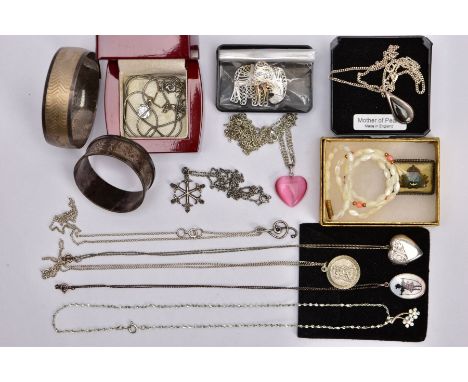 A SELECTION OF SILVER AND WHITE METAL ITEMS, to include a single silver napkin ring, engraved foliate design with a vacant ca