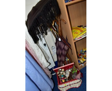 VARIOUS WALKING STICKS, SILVER HANDLED UMBRELLA, PARASOL, SEWING BASKET, ETC, to include a cast cotton reel holder with vario