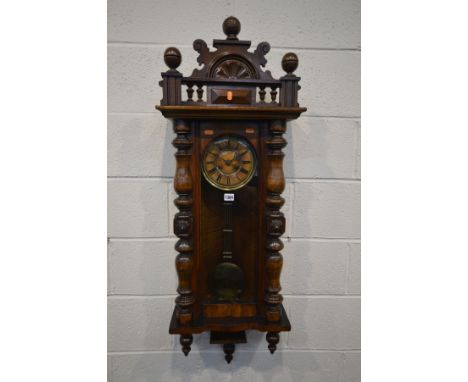 AN EARLY 20TH CENTURY VIENNA WALL CLOCK, height 119cm (winding key and pendulum)