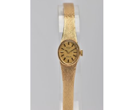 A LADIES 9CT GOLD ROTARY WRISTWATCH, hand wound movement, oval gold dial signed 'Rotary Twenty-One Jewels', baton markers, wi