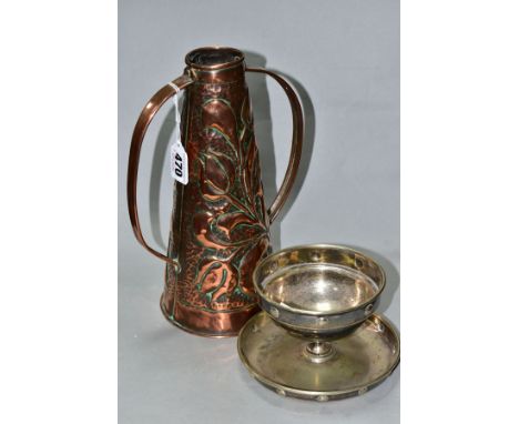 AN EARLY 20TH CENTURY ARTS AND CRAFTS TWIN HANDLED COPPER VASE, of conical form with hand hammered and embossed foliate decor