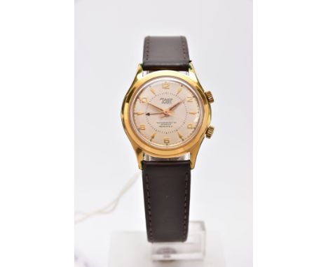 A VINTAGE RADO ALARM WRISTWATCH, the circular head with cream face and gold coloured numbers, batons and hands, to the brown 