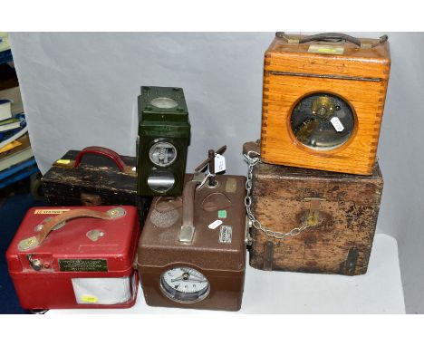 FIVE WOODEN, METAL AND PLASTIC CASED PIGEON CLOCKS, comprising a Toulet Imperator (locked), a Toulet Imperator fitted with a 