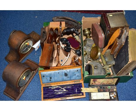 TWO BOXES OF CLOCKS, TREEN, METALWARES AND OTHER ITEMS, to include two 20th Century wooden cased mantel clocks (one with crac