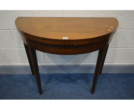 A GEORGIAN STYLE MAHOGANY DEMI LUNE CARD TABLE, with a fold over top, open diameter 96cm x height 72cm