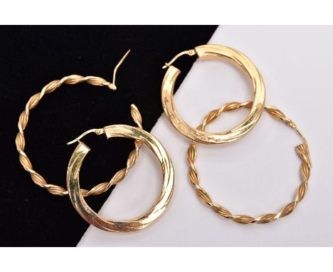 TWO PAIRS OF 9CT GOLD HOOP EARRINGS, the first of twist design, the second with engraved twist detail, both with 9ct import m