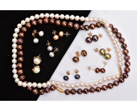 TWO CULTURED PEARL NECKLACES AND NINE PAIRS OF CULTURED PEARL EARRINGS, the first necklace designed with a row of individuall
