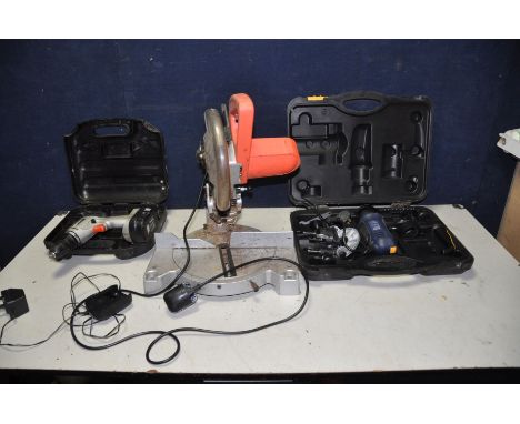 A PERFORMANCE POWER PRO ROTARY TOOL in case, a Silverline 8in Compound Mitre Saw and a Black and Decker 12v cordless drill (d