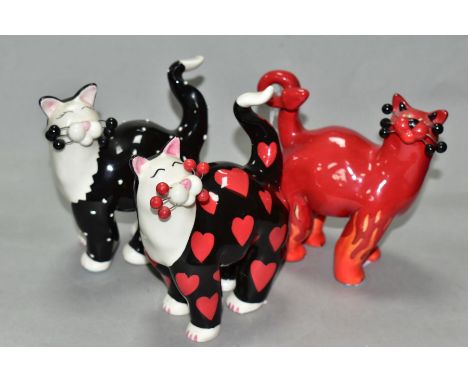 THREE LACOMBE WILLITTS DESIGNS 'WHIMSICLAY' CERAMIC CATS, comprising a black and white polka dot cat (15380), a black and whi