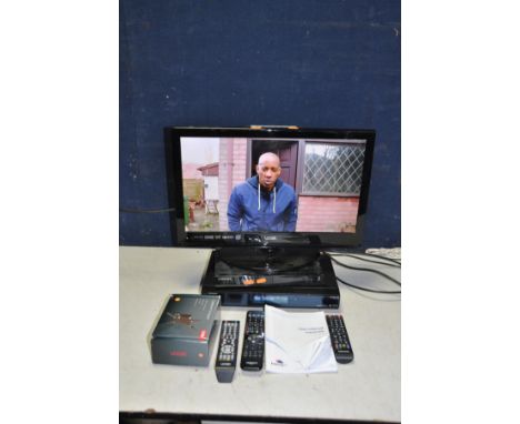 A LOGIK L22DVDB 22in TV DVD COMBI with remote, a Humax Freesat player with remote and manual, a Samsung Blu-ray player with r