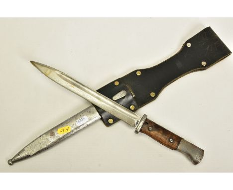 A WWII ERA GERMAN K98 MAUSER RIFLE BAYONET, scabbard and black frog which is incorrect for the item, blade is marked 6076 &am