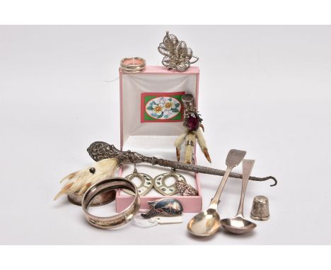 A TRAY OF SILVER AND WHITE METAL ITEMS, to include a silver fiddle pattern sauce spoon, (damage to the bowl) engraved monogra