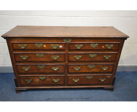 A GEORIGAN AND LATER OAK AND MAHOGANY CROSSBANDED LANCASHIRE CHEST, the front with four dummy drawers above four drawers, fie