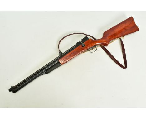 AN UNDER LEVER .17'' PUMP ACTION AIR RIFLE fitted with a rotary multishot magazine which uses a bolt to push pellets from the