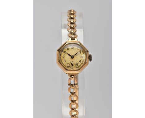 A LADIES 9CT GOLD WRISTWATCH, round silver dial (discoloured), Arabic numerals, seconds subsidiary dial at the six o'clock po