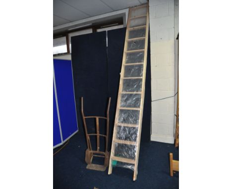 A MODERN DOLLE WOODEN TWELVE RUNG MEZZANINE LADDER construct in one length with no hinged joint total length 3.7m marked max.