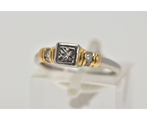 A BI-COLOUR DIAMOND DRESS RING, designed as a central princess cut diamond within a square collet mount with yellow gold band