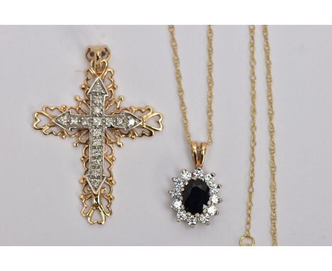 TWO 9CT GOLD GEM SET PENDANTS, the first designed as a diamond set cross with outer scalloped detail, length 38mm, the second