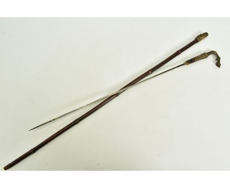 AN EXTREMELY HIGH QUALITY ANTIQUES SWORD STICK fitted with a square cross section blade tapered down to a round tip, its bras