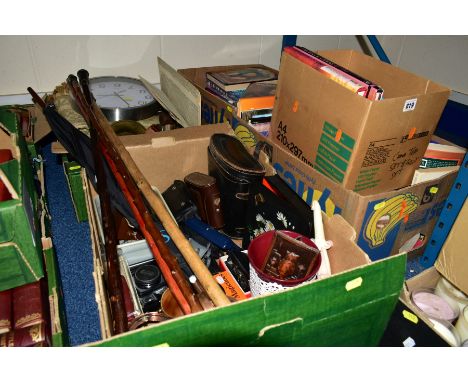 FIVE BOXES OF BOOKS AND ASSORTED ITEMS, the books to include Budhism, British monarchy, mental health and wellbeing, the asso