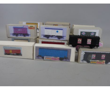 MODEL RAILWAY - Wrenn/Hornby Dublo goods wagons inclusive of six passenger fruit vans, blue, maroon, Players, Navy Cut, brown