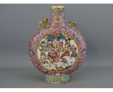 A 19th CENTURY CHINESE FAMILLE ROSE MOON FLASK VASE, the central circular panel decorated with a noble on horseback with his 