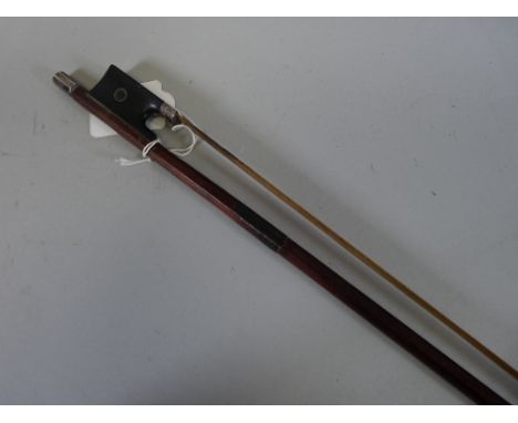 A FULL SIZE VIOLIN BOW stamped 'Dodd' to the stick and ebony frog, possibly silver adjuster and ferrule with mother of pearl 