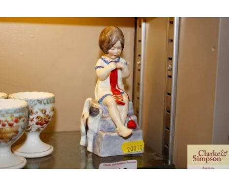 A Royal Worcester porcelain figure "Saturday's Child Works Hard For A Living"